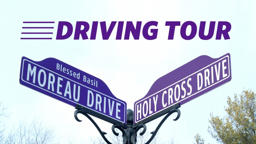 Road signs for Moreau Drive and Holy Cross Drive