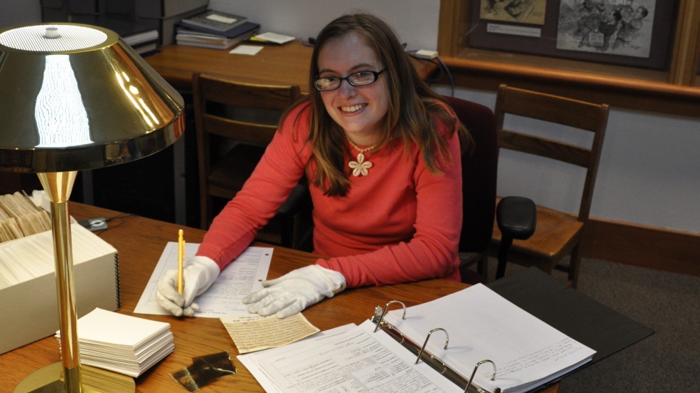 Student Intern Kristen Devoid processing Bauman Negatives