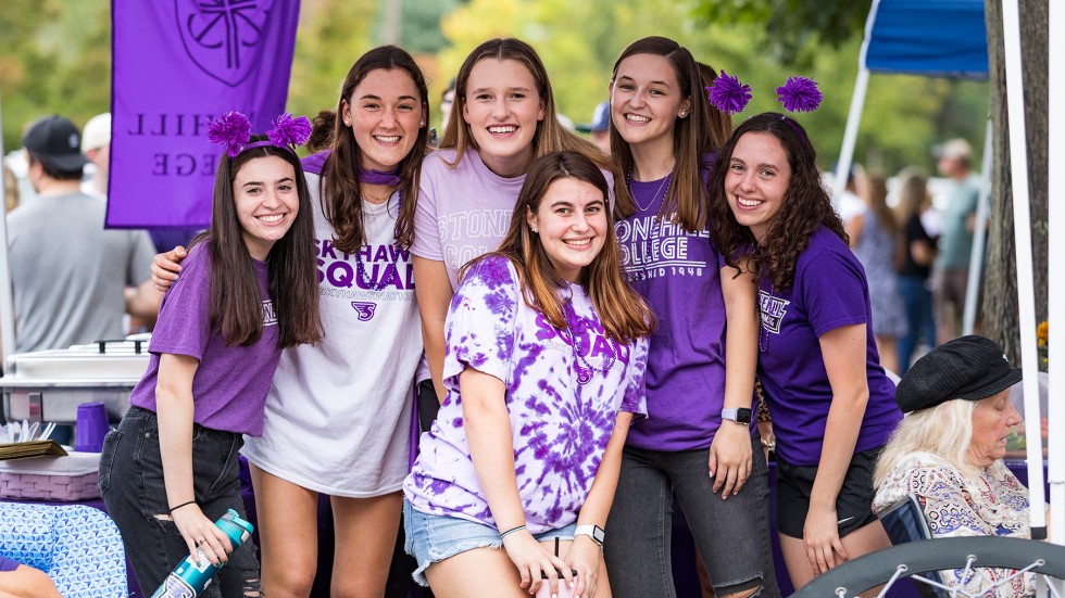 Student celebrating at Family Weekend