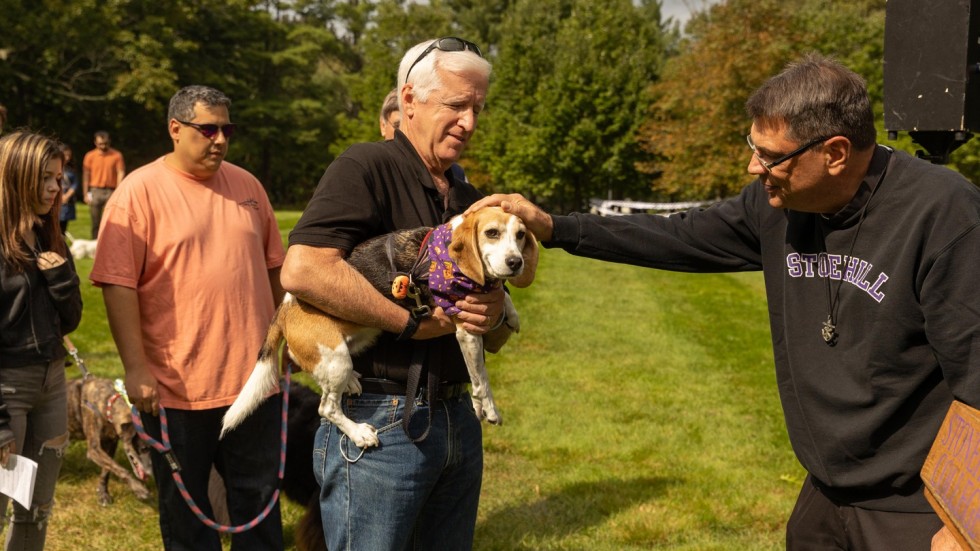 Fr. Tony blessing animal