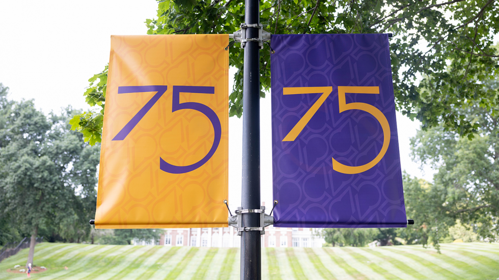 75th Anniversary banners in front of Donahue Hall.