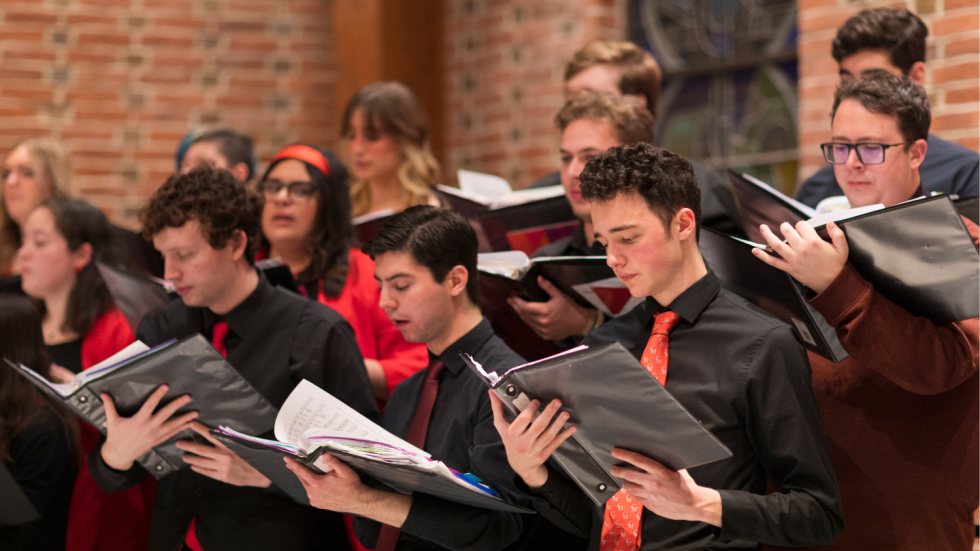 Choir members singing