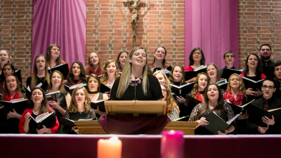 Choir members singing