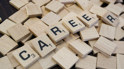 Scrabble tiles that spell out "Career"
