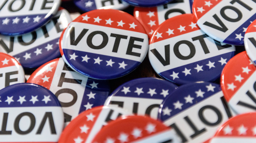 Pile of buttons that say "Vote"