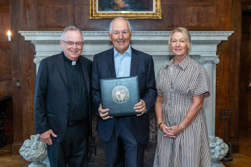 Left to Right: President John Denning, C.S.C.,Tom Bogan and Kathleen Bogan
