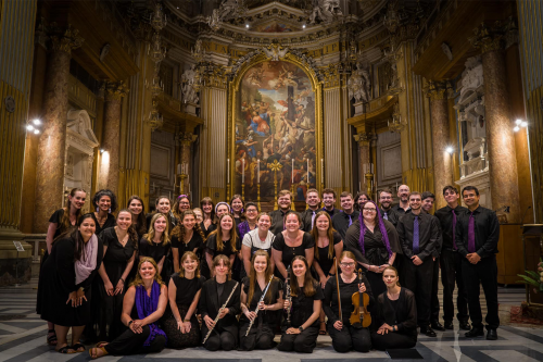 Members of the Stonehill College Chapel Choir pose for a group photo at the Basilica of the Twelve Holy Apostles.