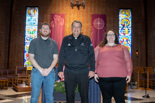 Left to right: Alec Haffner ’23, Rev. Anthony Szakaly, C.S.C., and Jessika Crockett-Murphy ’24