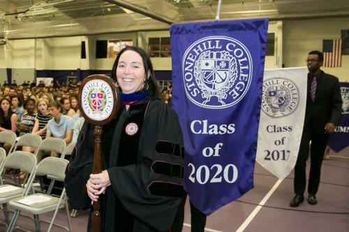 Professor Heather Bleakley leads the procession into Convocation