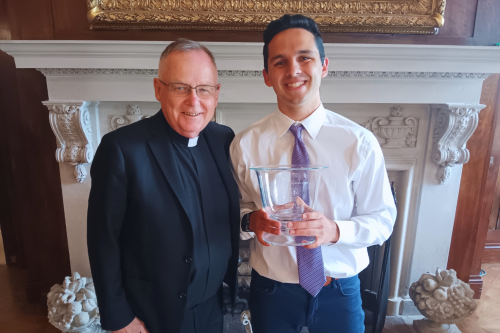President John Denning, C.S.C. (left) and Michael Keiran Leary '25 (right)