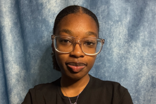 Amari Haynes '26 against blue backgrop