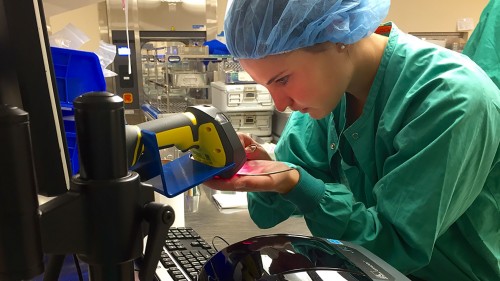 Abby Hersom ’18 scans a newly bar-coded instrument while at her internship at LeeSar