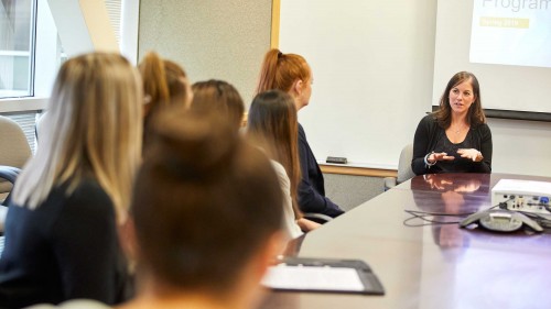 Members of Launch listen to a presentation at Dell offices in Hopkinton, Massachusetts, during the Spring 2019 semester