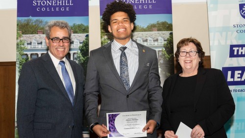 Pierrce Holmes '19 with former Provost Joe Favazza and Professor Anne Mattina