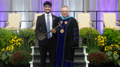 Senior Class President Guilherme Vaz ’25 (left) and President John Denning, C.S.C. (right)