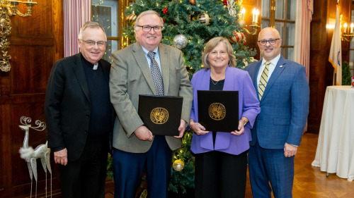 Left to Right: President John Denning, C.S.C., Professor Denis Malin, Professor Janet Brown-Sederberg, and Vice President for Academic Affairs Peter Ubertaccio