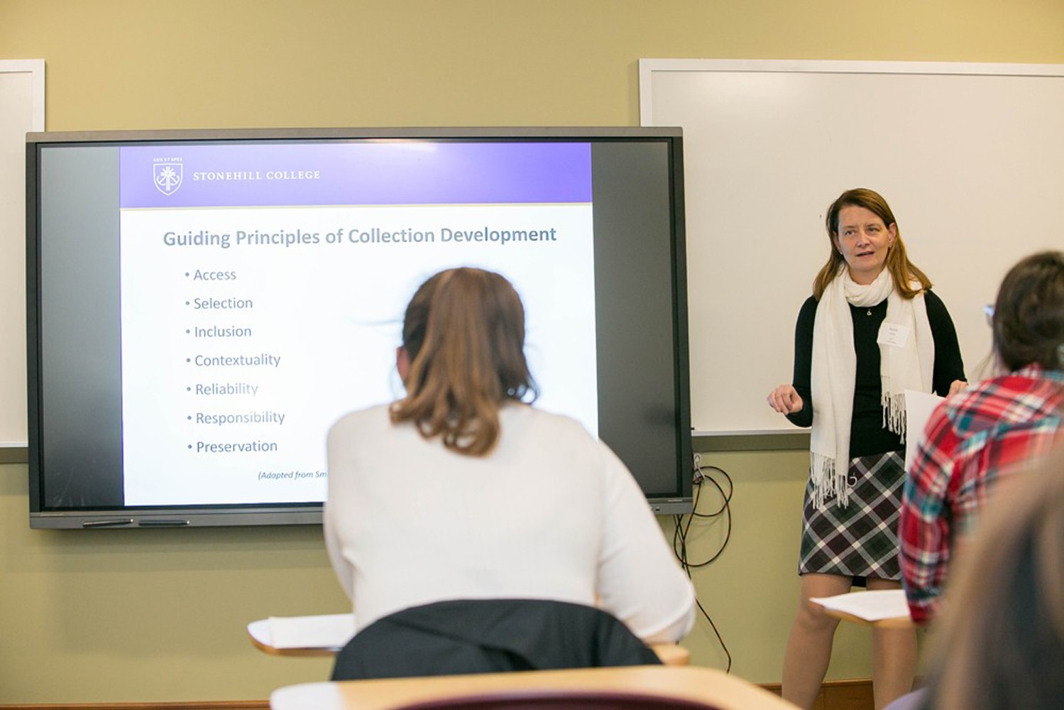 Nicole (Tourangeau) Casper '95 presents to a Conference breakout session