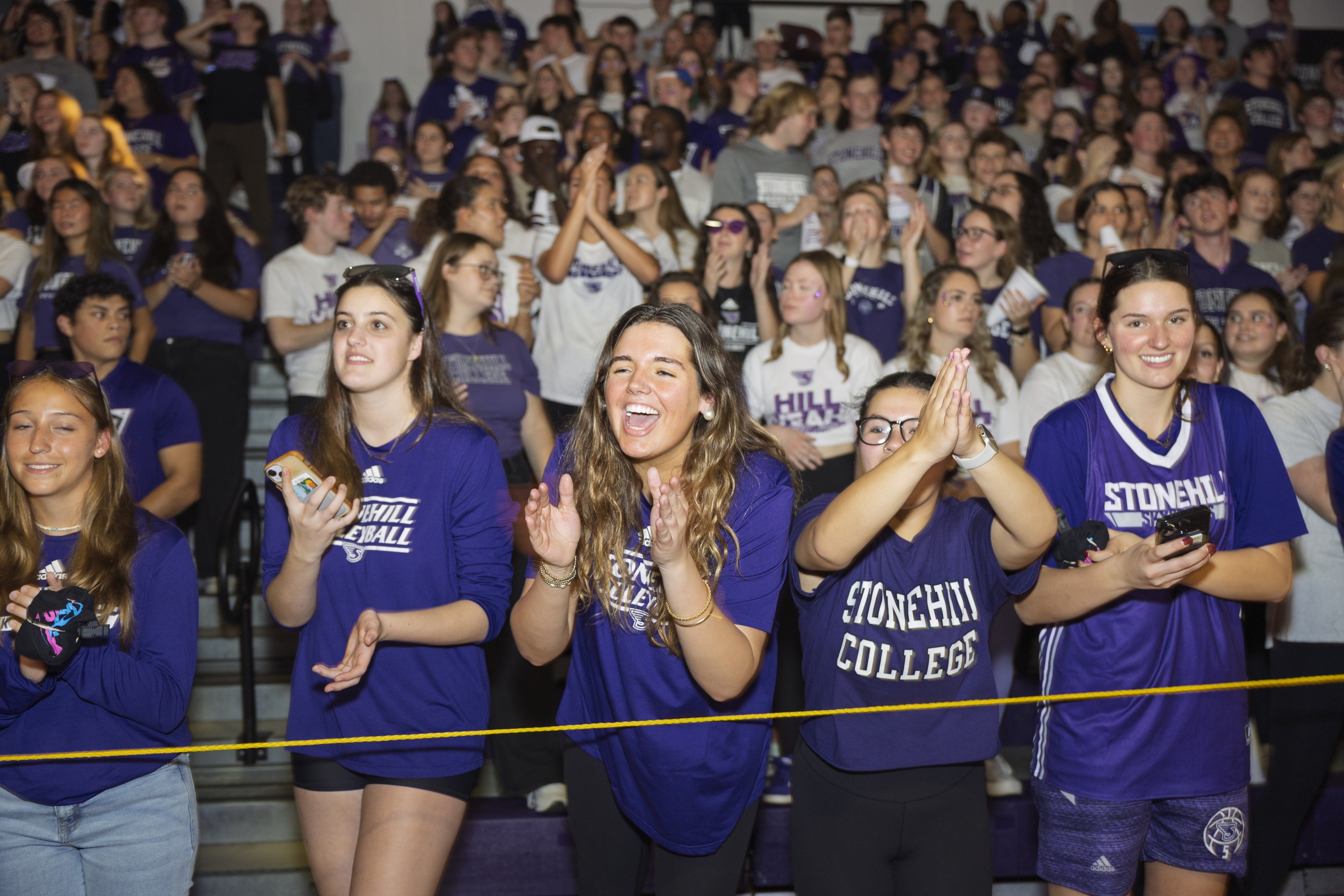 group of students cheering