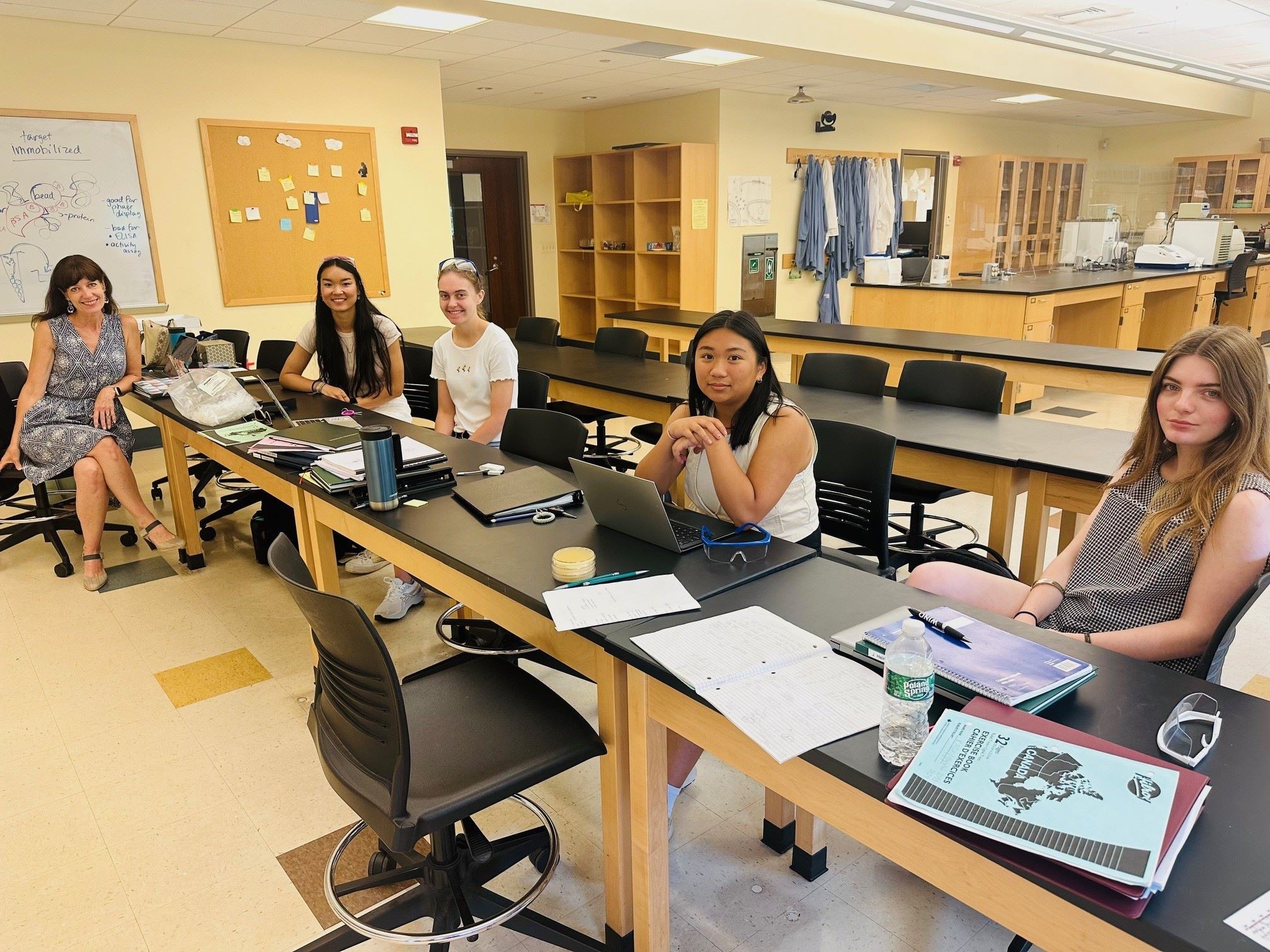 professor and students in lab