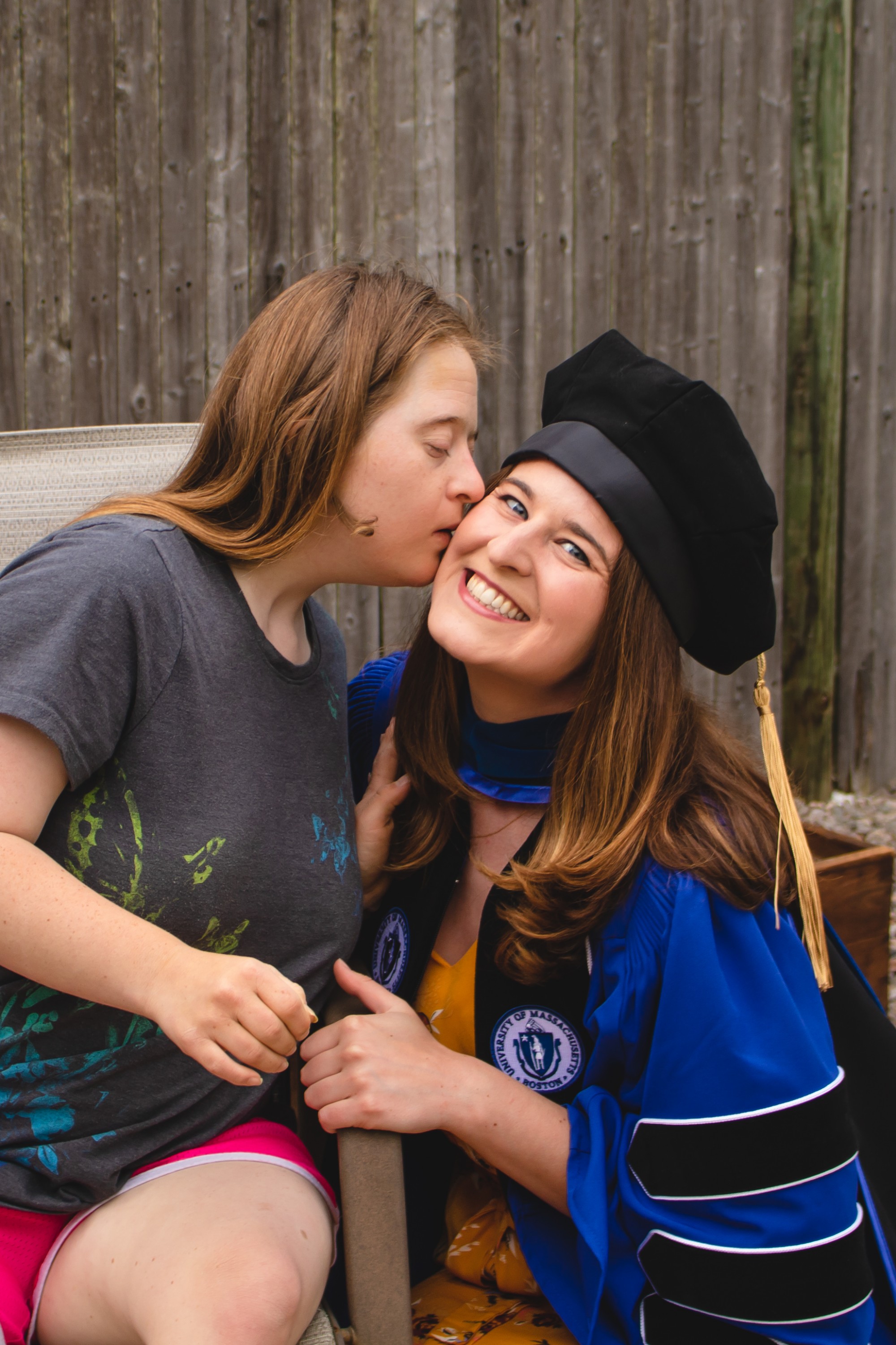 Emily Waldron (left) shows some love to her sister Danielle Waldron (right)