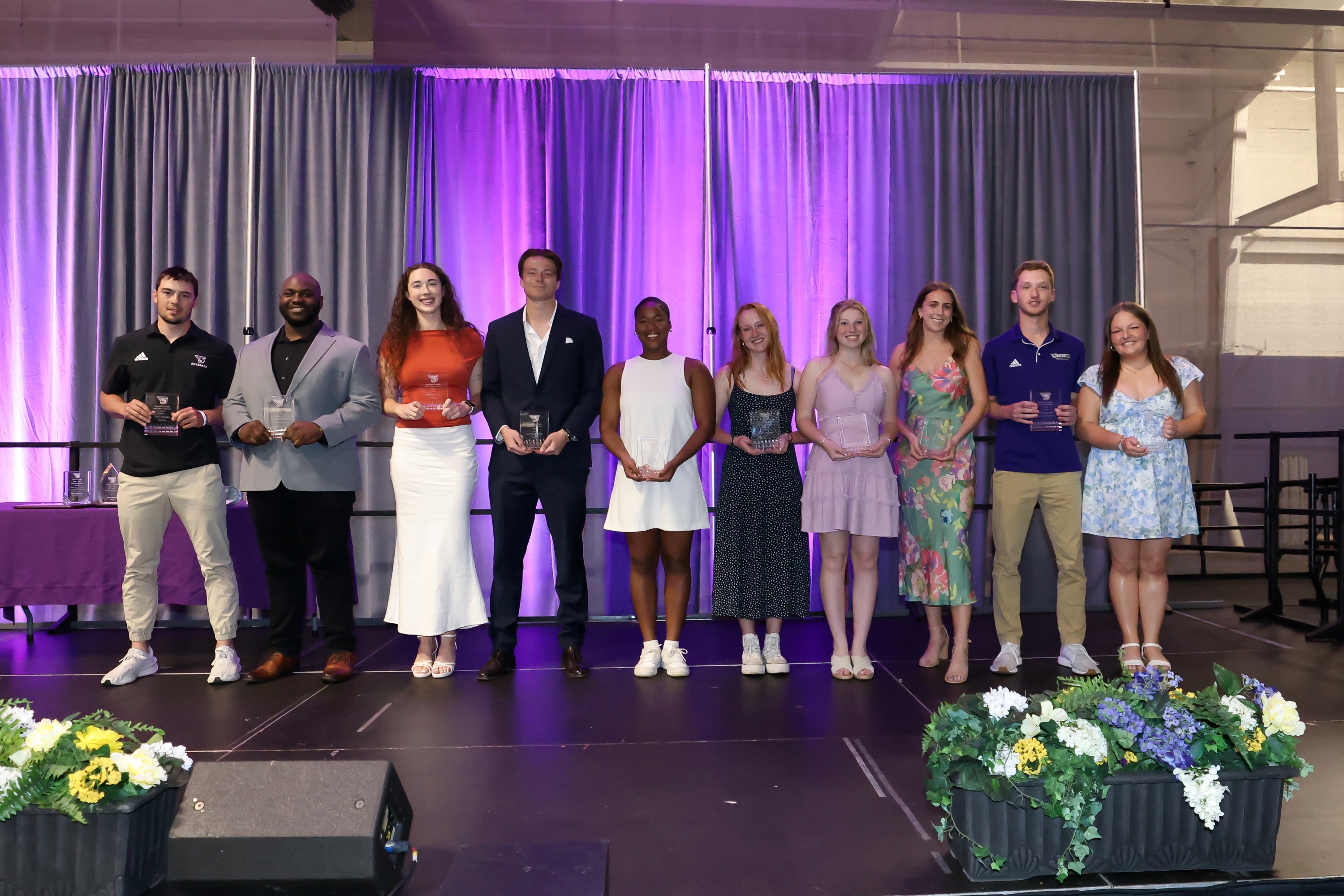 Student-Athletes on Stage with Awards